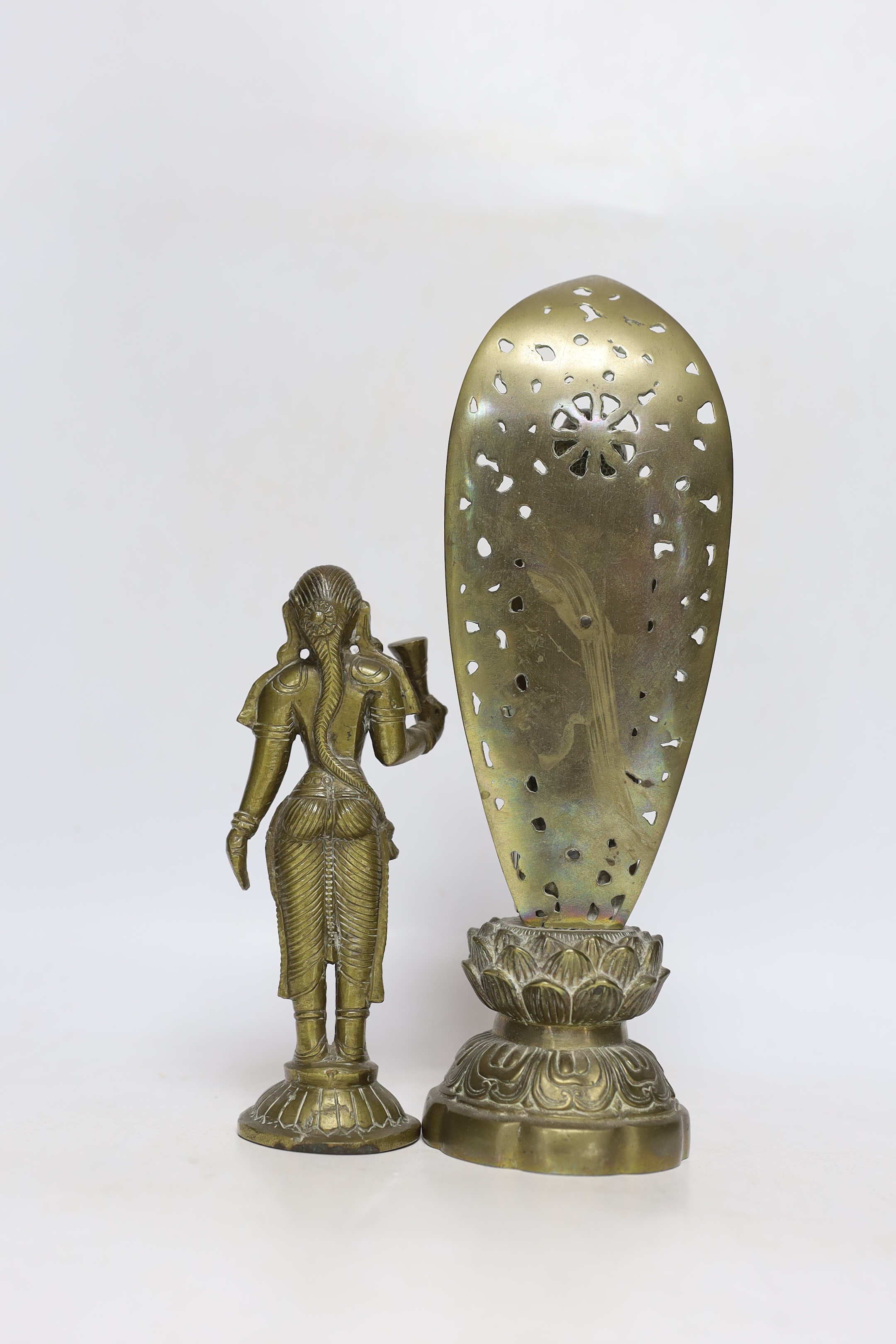 Four bronze deities and a Chinese copper pedestal bowl, tallest 29cm